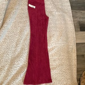 Velour like flare pants NWT. Large